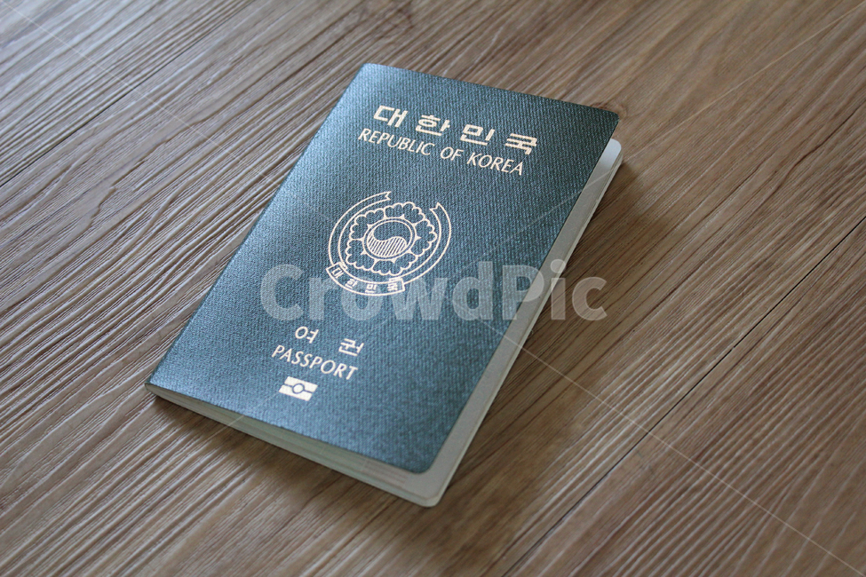 objects,white background,top angle,security,identification,passport,Republic of Korea passport,identity,id,international,citizen,Korean passport,green,business,top view,pass,emigration,korea,face,White,republicofkorea,wooden,thing,card