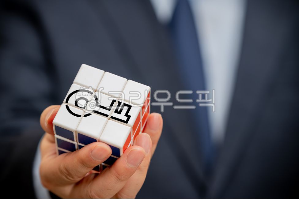 Brainstorming,thought,idea,concept,operator,professional,holding,problem,solution,innovatory,catch,man,keyword,key,hand,innovation,close up,manager,business,assignment,problem solving,target,marketing,management,Cube,business man,success,person,puzzle,sol