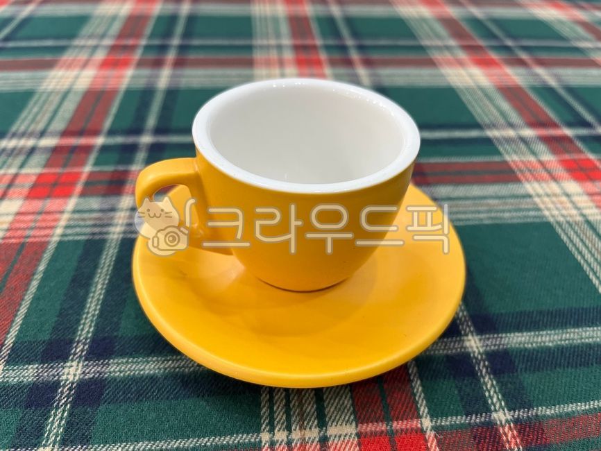 mug cup,tablecloth,winter,mug,table,yellow cup,cup