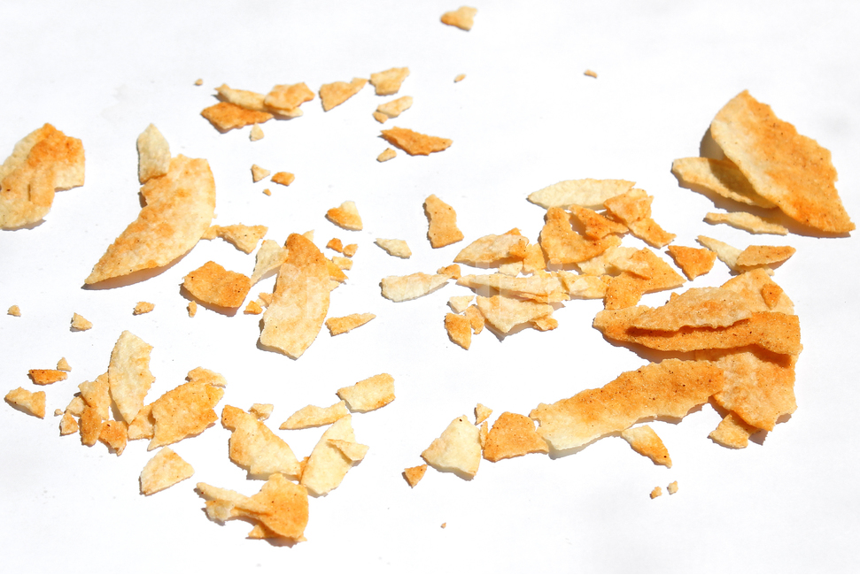 cookie powder,snack,yellow,white background,powder,top angle,Potato,Potato Chips,debris,cooking,potato chips,fragmented,broken,close up,KeywordBiscuit,cookie,top view,brown,food,thin,piece,biscuit,cookie crumbs