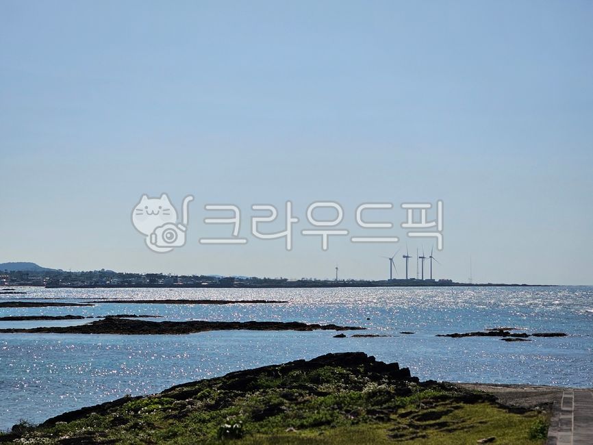 blue,sunny,scenery,landscape,outdoor,nature,landscape,sea,coast,water,sky,blue,clear,windmill,jeju island