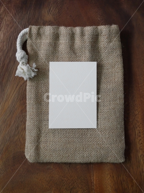 gift,sack,texture,woodbackground,memo,wood pattern,tree background,prop,giftbox,latter,tag,event,card,pocket,object