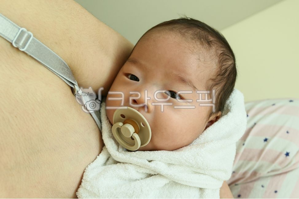 small,infant and toddler,young,0 years old,held,mothers arms,cute,one year old,eyes,angelic,human,soother,parenting,nose,pacifier,lovely,side,precious,Baby,newborn,1 year old,face,mouth,person,baby,family