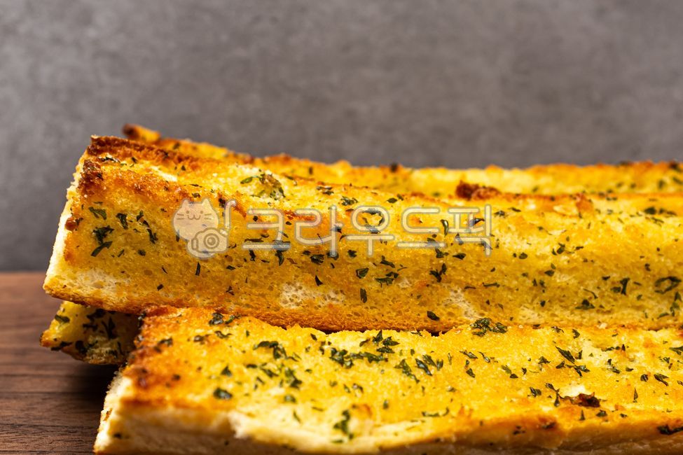 seasoning,garlic bread,sauce,Garlic Bread,parsley,honey,flour,Garlic Baguette Sticks,Food Ingredients,ingredients,stick,baguette,soft,Garlic Baguette,garlic,close up,bread,butter,ingredient,food,Herb,meal,grocery,sweet