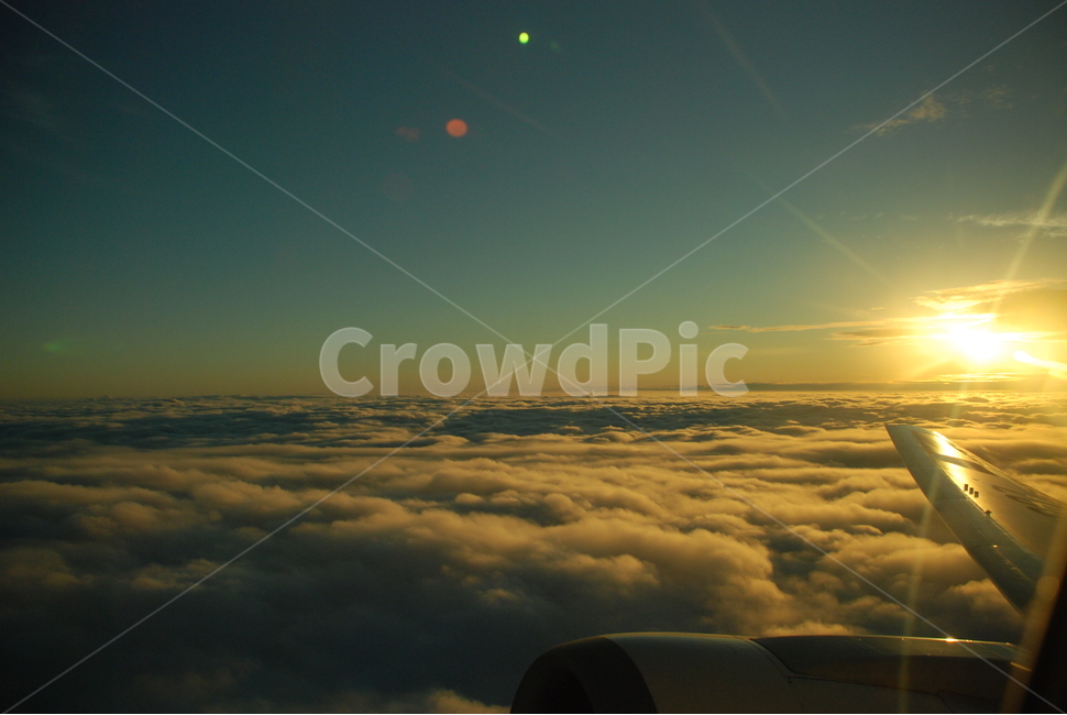 sky,cloud,sunshine,airplane sunset,sunset,Outside the airplane window