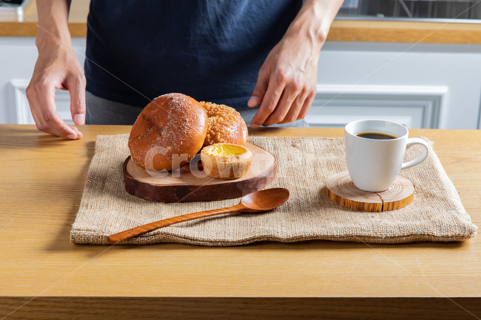 Sweet red bean bread,tablecloth,Meal,inside,interior,hungry,modern,coffee cup,neat,kitchen,table,hand,Woodenware,bread,tree,equipment,delicious,food,Lunch,Tray,pastry,spoon and chopsticks,White,mug cup,brunch,coffee,Spoon,organized,breakfast,sweet