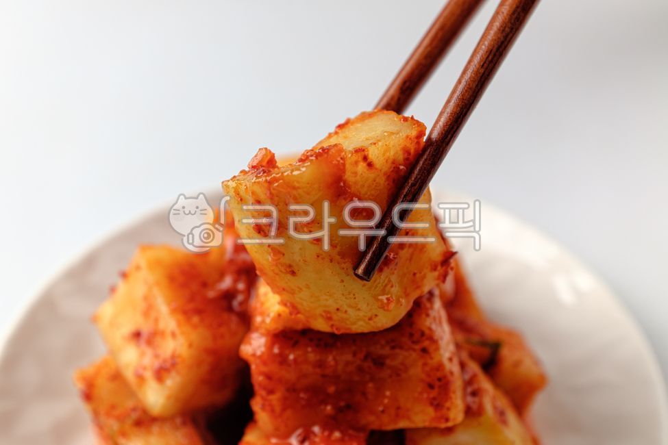 Radish kimchi,seasoning,close up,ingredient,kimchi,radish,vegetarian diet,Korean culture,spicy,vegetable,food,Stiff,meal,Korean food,grocery,Food Ingredients,ingredients