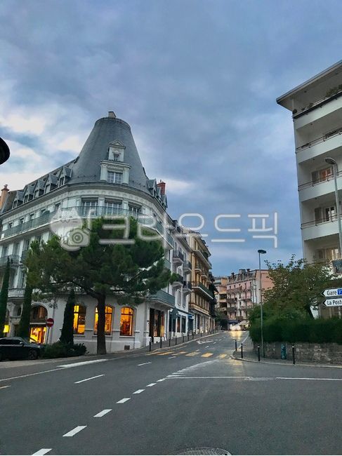 tree,asphalt,Swiss,building,crosswalk,Town,road,european village,intersection,road name,architecture