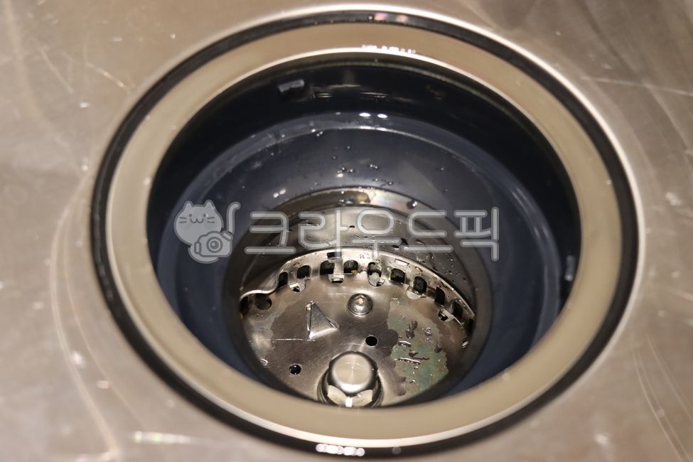 sewer,sink,food waste processor,kitchen