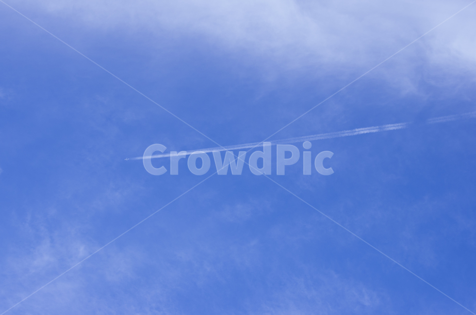 cloud,sky,contrail,blue sky,airplane