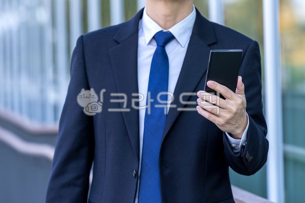 business,work,mobile,korean,employee,cell phone,business man,person,50s,suit,man,hand