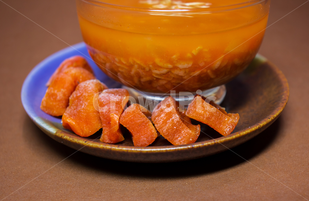 lunch,Sikhye,Thanksgiving,Lunar New Year food,new year,Lactobacillus,holiday food,oriental,drink,traditional,fermentation,Eastern,tasty,breakfast,cup,sikhye,plate,hot,holiday,local,beverage,lactobacillus,dried persimmon,cooking,tradition,glass bowl,table,