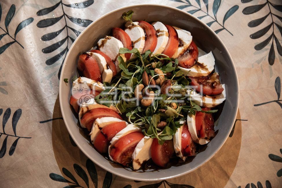 salad,snack,almond,tomato,vegetable,peanuts,vegetables,cheese,nuts,peanut,snacks