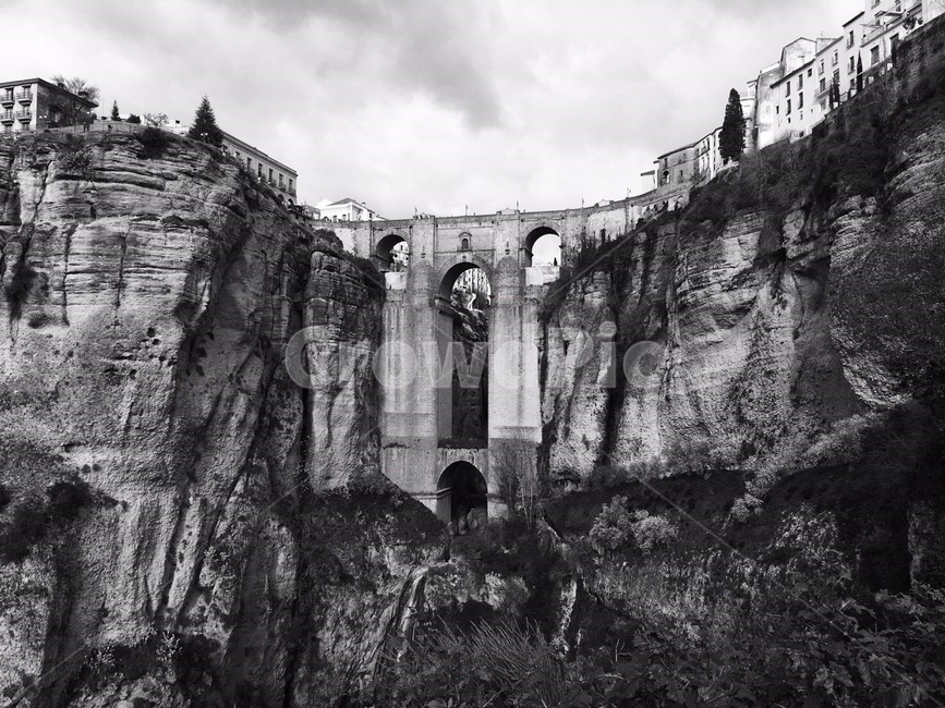 bridge between cliffs,cliff bridge,bridge,black and white,from the bottom of the cliff to the top