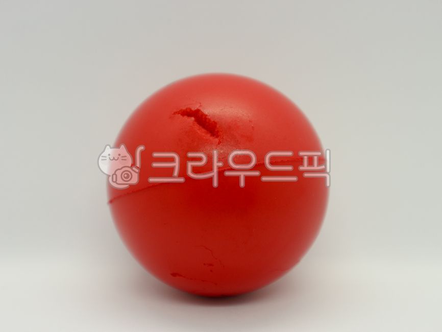 ball,scratched ball,sphere,red ball,toy