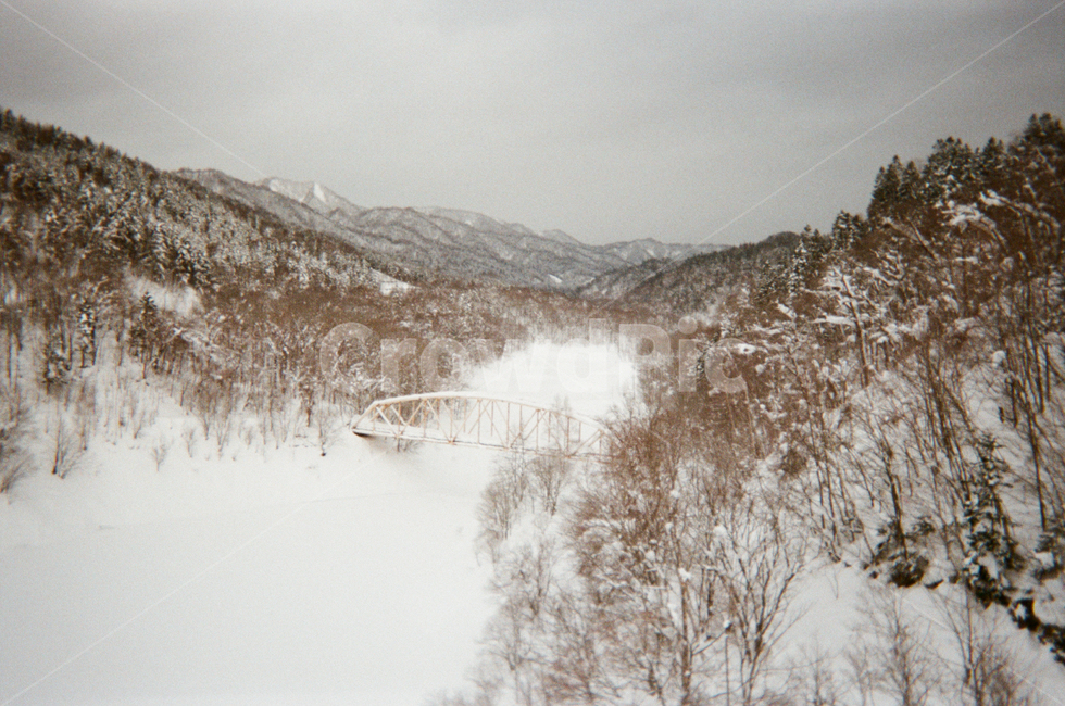 snow covered river,snow mountain,snow scene,winter mountain,winter landscape,Hokkaido,snow covered mountain