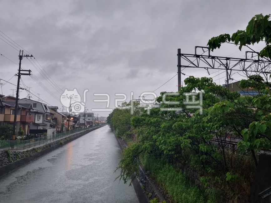 Quiet,riverbank,canal,water,cloudy day