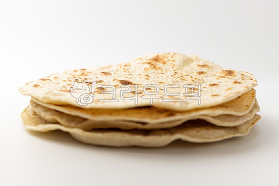 close up,I am,bread,butter,Chewy,Butter naan,savory,level,Indian food,Indian bread,food,meal,flatbread,Indian culture,flour,plain,grocery,Food Ingredients,ingredients