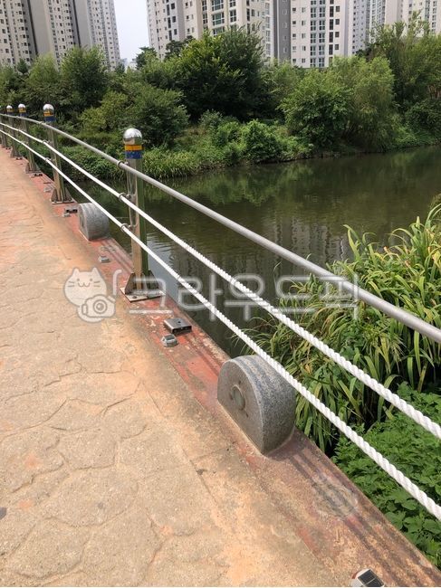 handrail,road,stream,railing,banister,bridge,lake