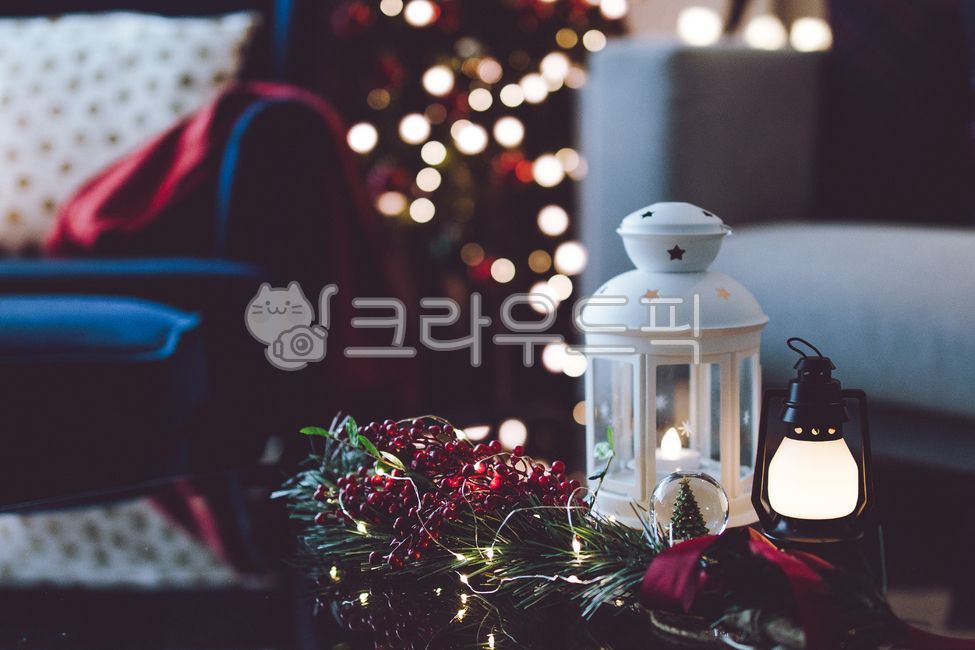 christmas decoration,christmas tree,winter,christmastree,Sofa,ornament,cushion,living room,livingroom,fire,christmasornament,sofa,Fruit,wingchair,chair,wing chair,tree,red fruit,lamp,lighting,christmas,lantern,light,bokeh