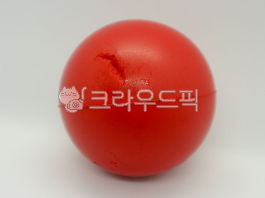 ball,scratched ball,sphere,red ball,toy