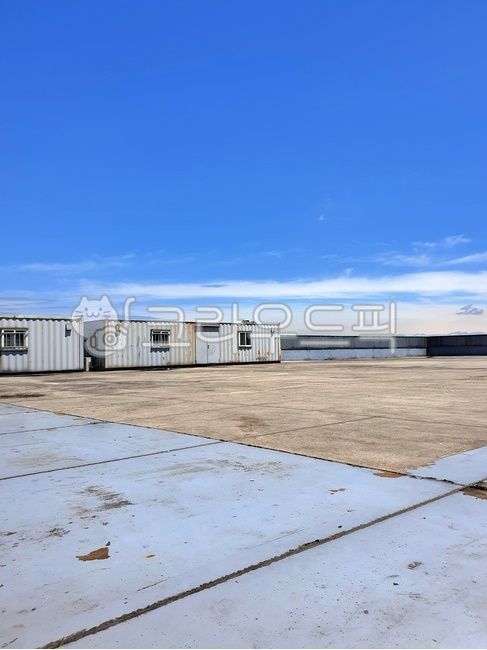 container,blue sky,blue,old floor,container box,rooftop,building