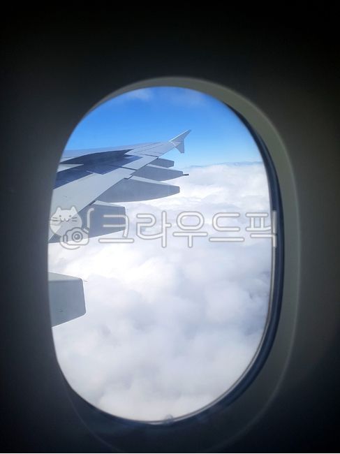 sky,cloud,window,wing,Inside the plane