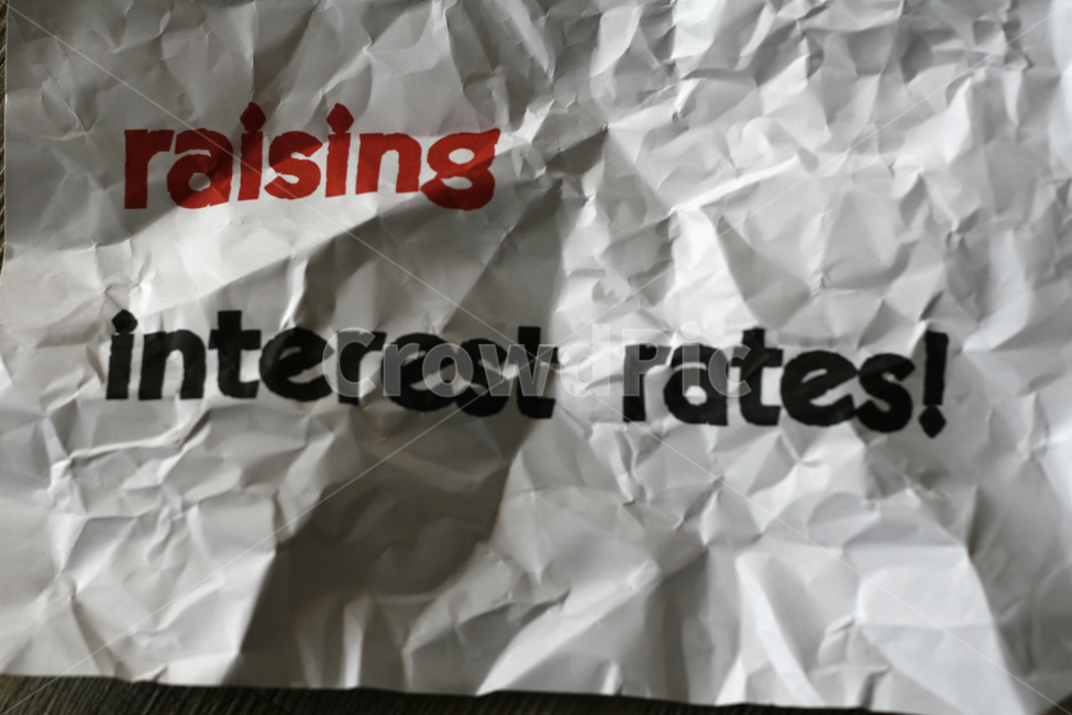 interest rate,paper,crumpled,warning,increase