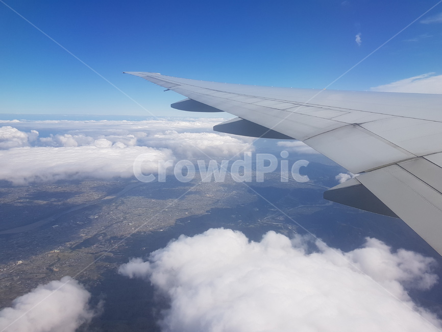 airplane wings,cloud,sky,wing