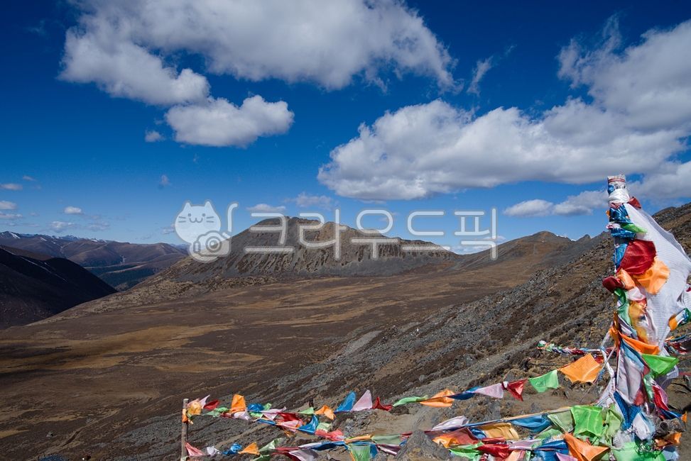 Tarcho,Buddhist culture,high peaks,Himalayas,trekking,Sichuan,China,scriptures,Buddhist scriptures,wind,sky,flags,five-colored flags,clouds,beautiful background,scenic spots,natural