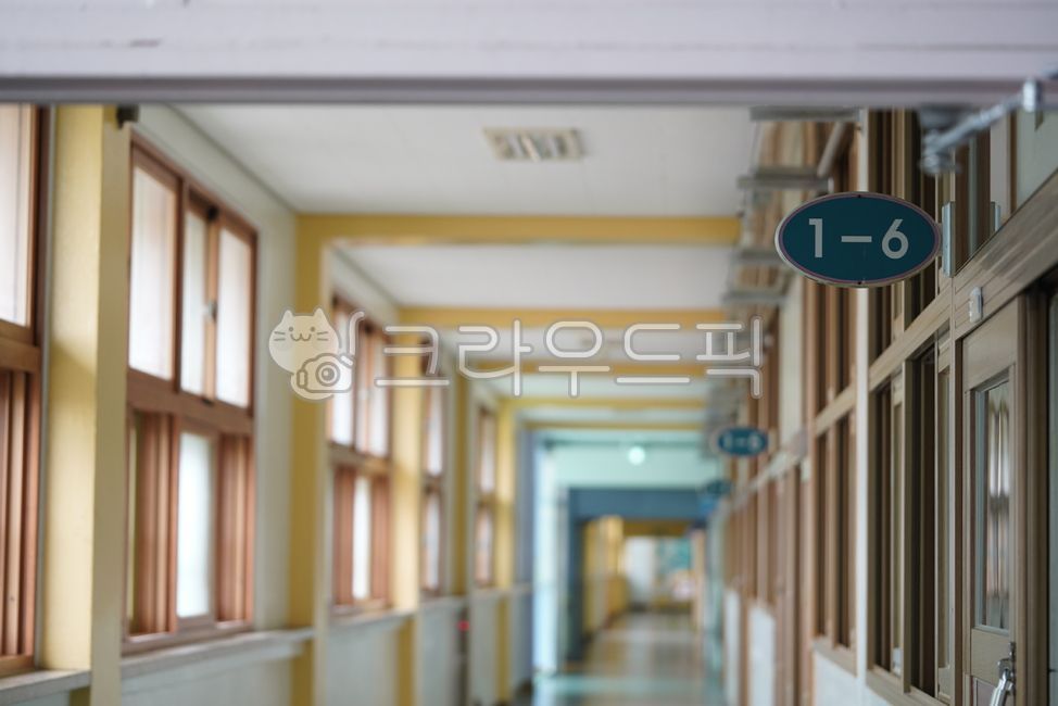 corridor,sign,classroom,inside,building,number,school,wood,window,by the window,architecture
