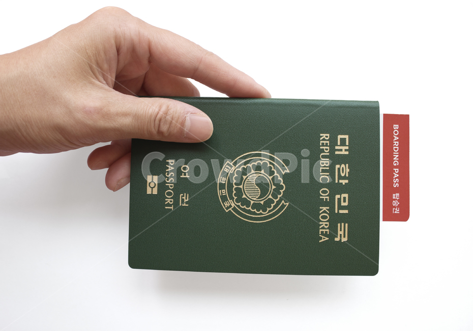 womans hand,objects,body,top angle,security,identification,passport,Republic of Korea passport,identity,id,catch,international,female,hand,tower,citizen,Korean passport,business,top view,ticket,pass,emigration,body parts,korea,airplane ticket,republicofko
