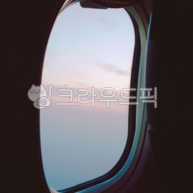 flight,pink,pinkcloud,out the window,cloud,pink clouds,sky,pink sky,airplane interior,airplane window,blue,airplane,sunset,window,Sky blue