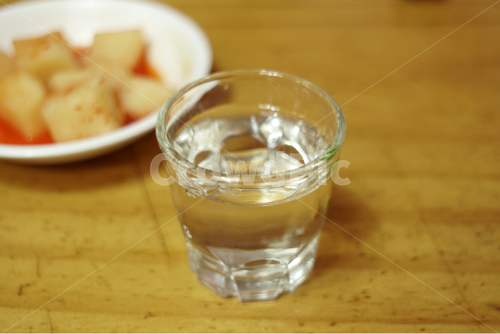 A glass of soju,soju,Just one drink,Drinking,snack cart,Drinking alone,soju glass