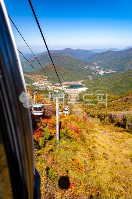 A national park,cable car,tree,mountain range,skyline,Muju Resort,Deogyusan Mountain,transportation,outdoor,mountain,Panorama,Valley,plant,sight,perspective,autumn,cable,Mujugun,Maple