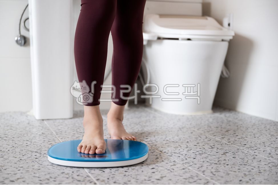 measuring,woman,beauty,front view,slim,scale,measurement,leg,healthcare,shower room,balance,fitness,barefoot,wellness,diet,female,leggings,bathroom,foot,sink,weight management,weight loss,health,weight,calories,Weight,standing,toilet,management,person,med