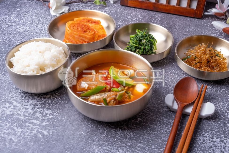 soup,soup bowl,table setting,dining table,chopsticks,soup dish,plate,bowl,side dish,Jinmichae,spicy stew,table,Herbs,rice bowl,Kimchi,kimchi,restaurant,squid stew,Korean,rice,Stirfried Jinmicae,food,Stirfried squid,meal,Mugwort,Spicy Rockfish Soup,home fo