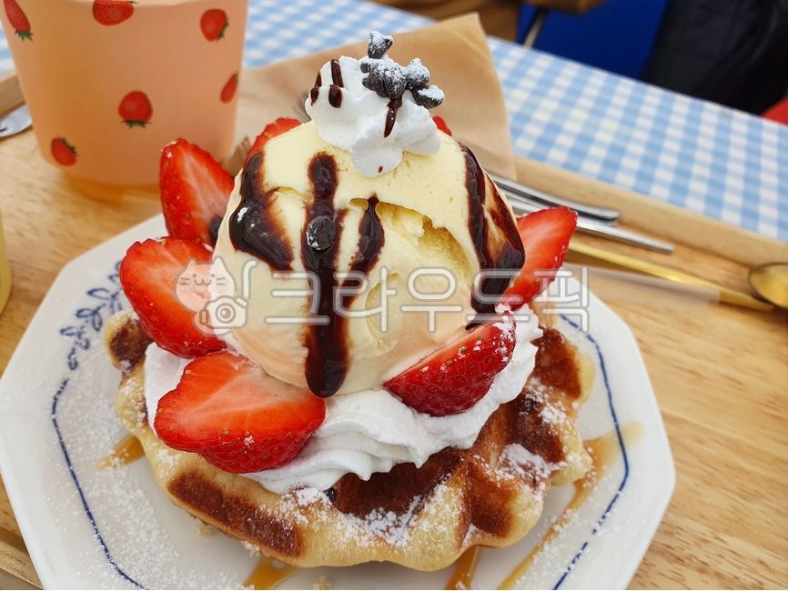 creme,fruit waffle,strawberry,plate,cream,wooden tray,Whipped Cream Waffle,ice cream,chocolate syrup,waffle,whipping cream,dessert,vanilla ice cream